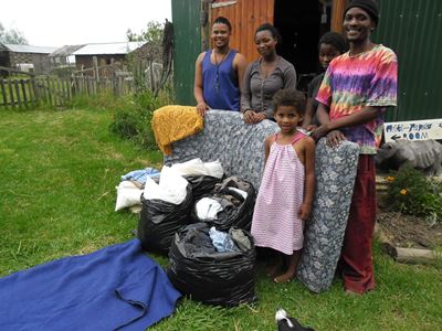 Residents help destitute fire victims