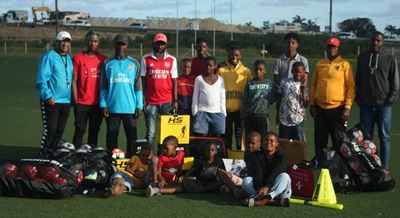 Black cats receive new soccer equipment
