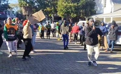 Community demands no bail for municipal worker allegedly selling jobs