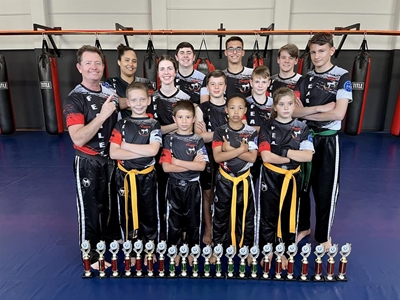 Grebe's-skopboksklub ryg medaljes in