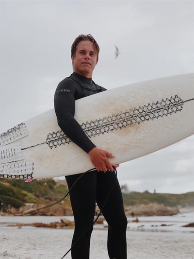 Memorial paddle-out for young surfer