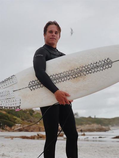 Memorial paddle-out for young surfer