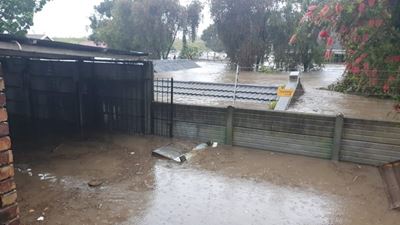 Home flooded - emergency personnel to assist