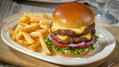 Why a noisy restaurant makes you crave a cheeseburger over a salad