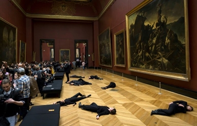 Climate protest prompts partial evacuation at Louvre