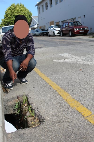 Gaping hole a danger to pedestrians