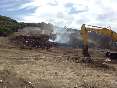 Pungent plumes persist at garden refuse site