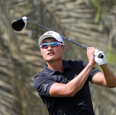Li beats McIlroy to Dubai title