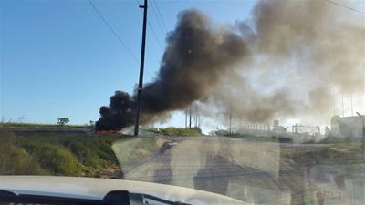 Tyre burning causes a stink