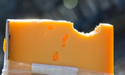 Thief steals cheese and bites guard