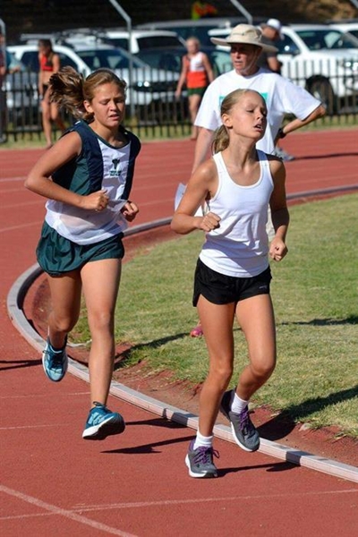 Young athlete keeps rival going