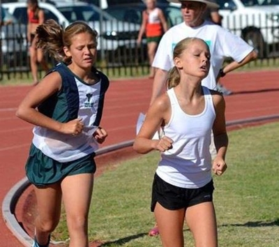 Young athlete keeps rival going