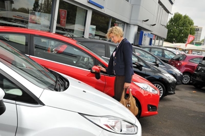 Buying a car, new or used?