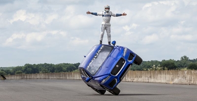 Two-wheel action in a Jaguar of all things