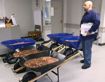 Disgruntled US man pays vehicle sales tax with 300 000 pennies