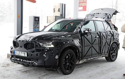 Camouflaged baby Volvo XC spied again
