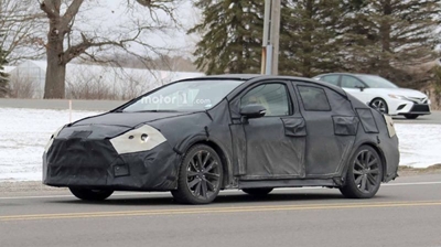 Next Toyota Corolla imagined with Auris styling as new spy shots emerge
