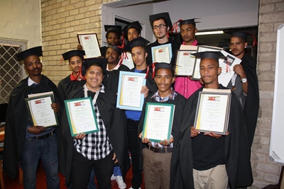 Caps and gowns for YFS and Emzini graduates
