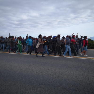 Community members marching to court
