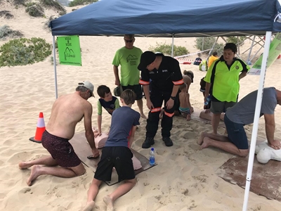 Beachgoers take 5