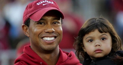Woods shines as Fowler stuns