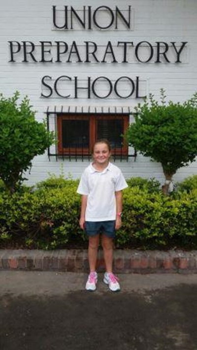 Young girl shines at tennis tournament