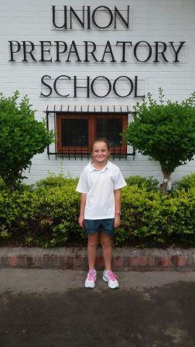 Young girl shines at tennis tournament