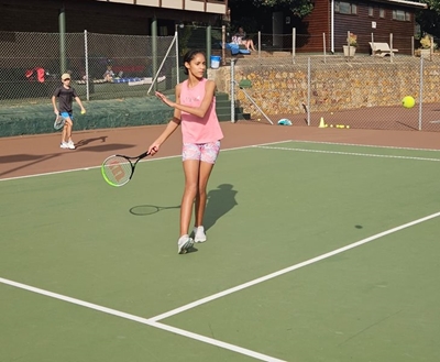 Tennis player wins gold after years of hard work