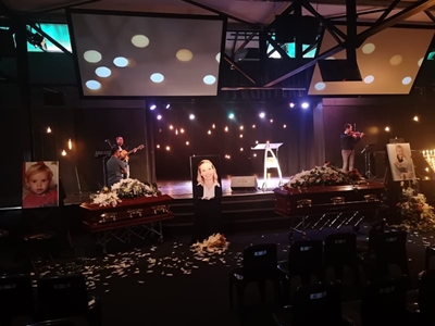 Touching memorial service for mother and children