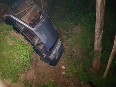 Abandoned car found at bottom of bridge