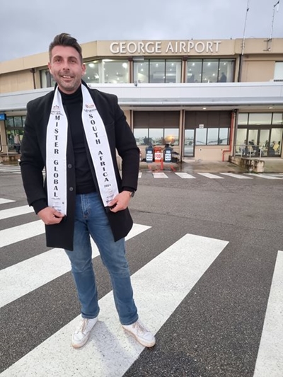 Mr Global SA winner, Mossel Bay's Anton, arrives at George Airport