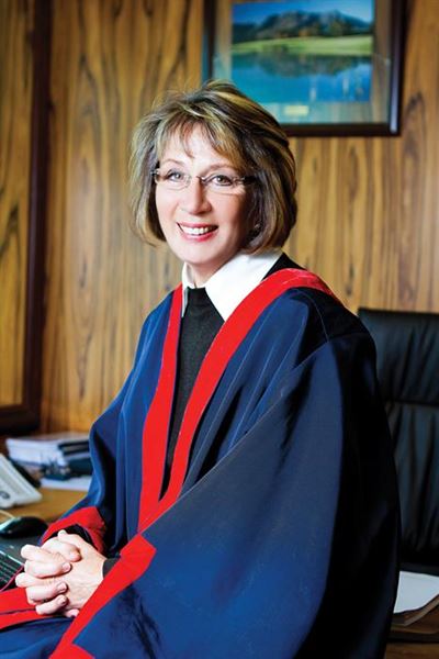 Speaker serves on women's commision