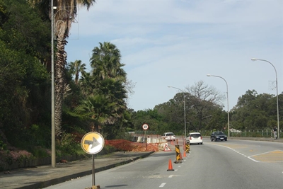 Lane still closed after collapsed slope