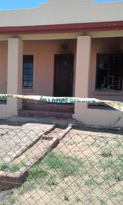Woman arrested after house fire 