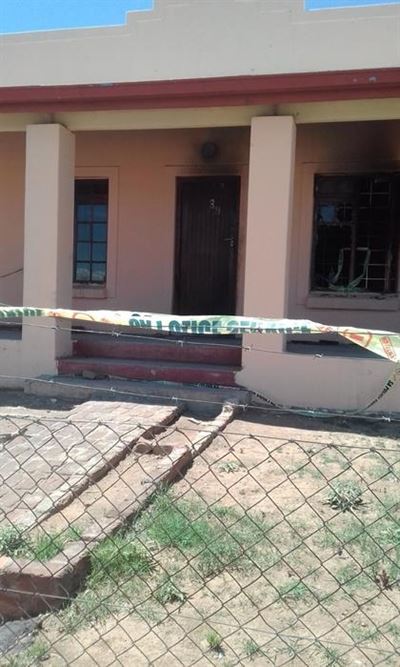 Woman arrested after house fire 