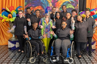 Mardi Gras festivities at Gourmets & Gourmands ‘24 raise funds for Carpe Diem School