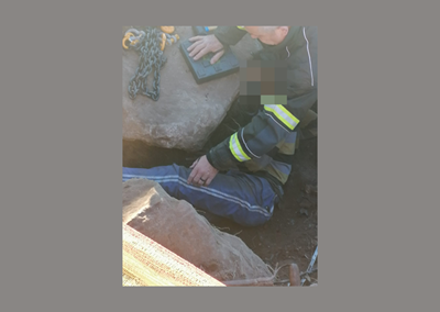 Man rescued after being trapped by rock