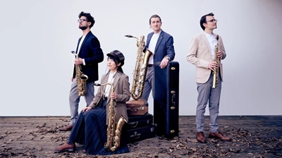 Four melodious saxophones in concert tomorrow