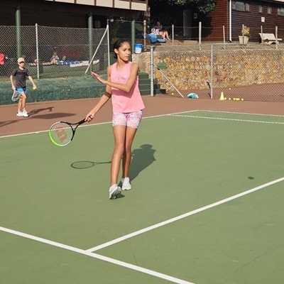 Tennis player wins gold after years of hard work