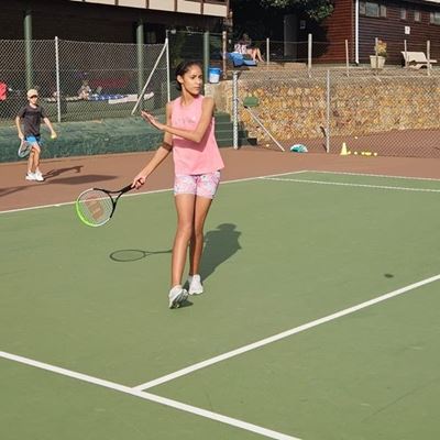 Tennis player wins gold after years of hard work