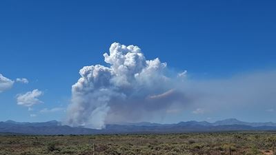 Fire and  Rescue Services crew actively fighting fire