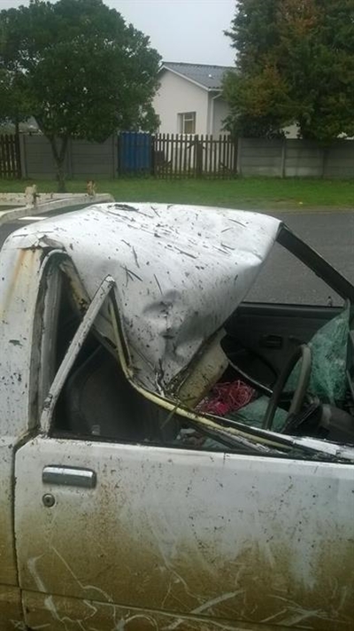 Bakkie crashes into fallen tree