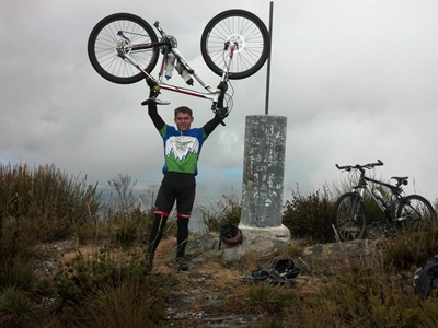 Trio cycle up George Peak for SPCA