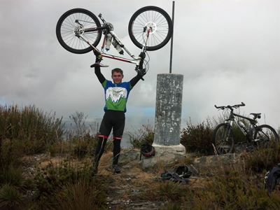 Trio cycle up George Peak for SPCA