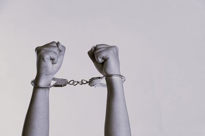 Woman stabbed 19 times, man arrested