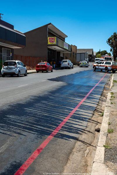 Road closed due to  hydraulic oil spill
