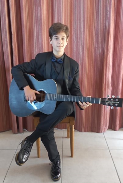 See musical whizz-kid in action