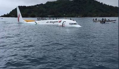 Plane ditches into Pacific lagoon