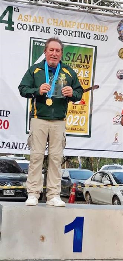 Plett's clay target shooter flies town flag high in Asia