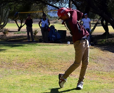 Young golfer takes a swing in the right direction